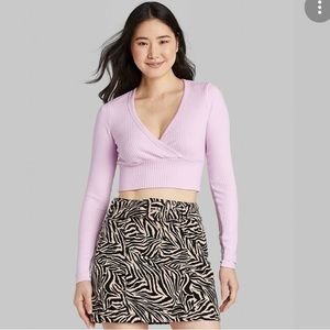 Lavender long sleeve crop top.